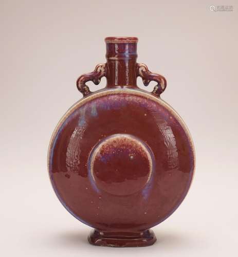 A flambe glazed moonflask