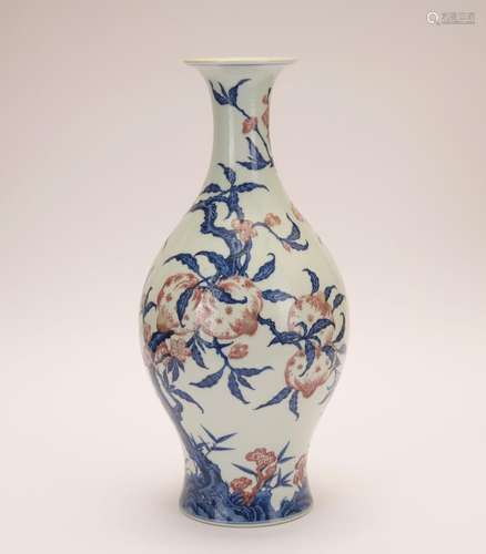 An underglaze-blue and copper-red glazed 'floral' vase