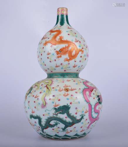 A famille-rose 'dragon' gourd-shaped vase