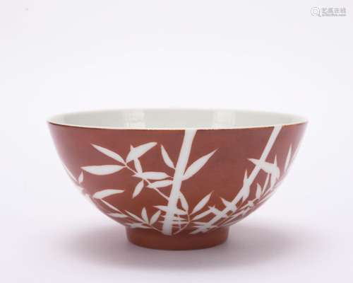 A red-glazed and blank-leaving 'bamboo' bowl