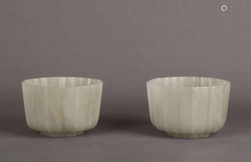 A pair of jade ridged melon bowl