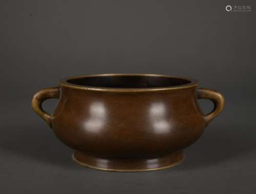 A bronze censer