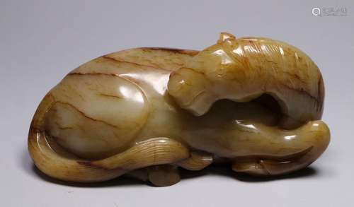 A jade horse shaped ornament