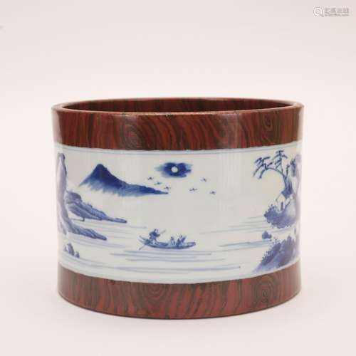 A blue and white <br />
wood grain glazed 'landscape' pen co...