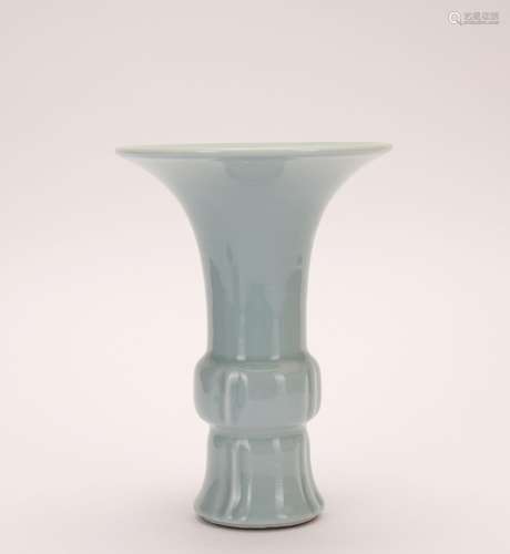 A celadon-glazed vase