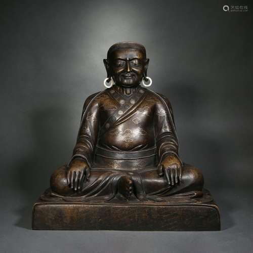 A bronze statue of Marpa