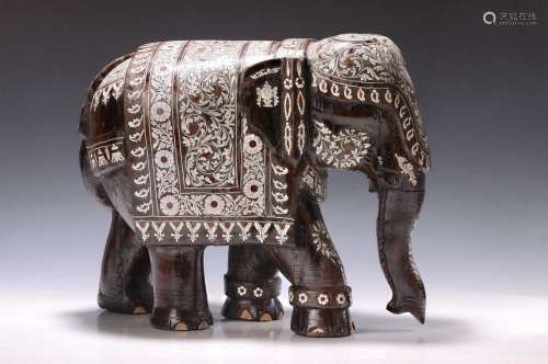 Large wooden sculpture in the form of an elephant