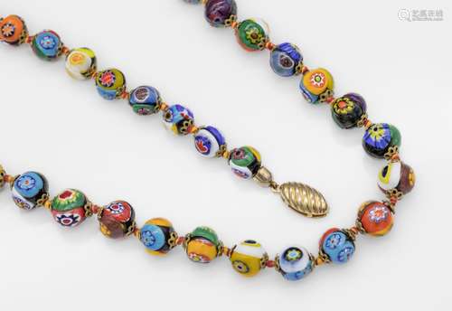 Extra long chain made of Murano-glass spheres