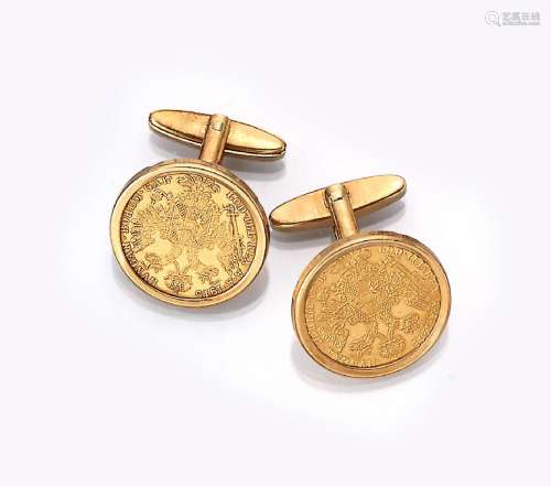 Pair of 14 kt gold cuff links with coins