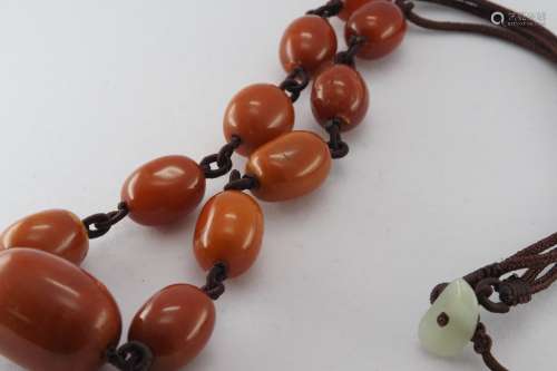 Natural old amber necklace with jade toggles
