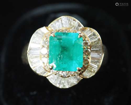 Natural emerald and diamond ring