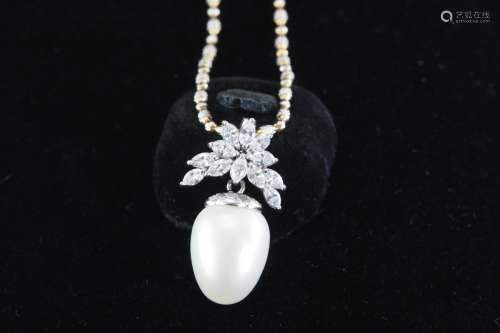 Natural cultered pearl and diamond pendant