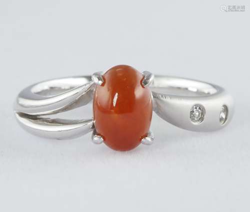 Natural red jadeite and diamond ring