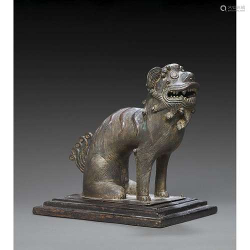 STATUETTE DE LION BOUDDHIQUEen bronze de belle patine brune ...