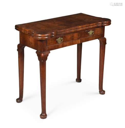 A GEORGE II WALNUT AND FEATHER BANDED FOLDING CARD TABLE, CI...
