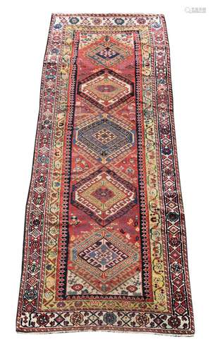 A NORTH WEST PERSIAN RUNNER, approximately 253 x 85cm