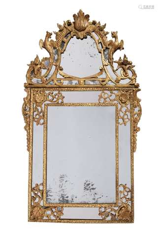 A REGENCE GILTWOOD WALL MIRROR, CIRCA 1720