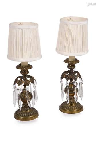 A PAIR OF GILT BRASS CANDLESTICKS, 19TH CENTURY AND LATER FI...