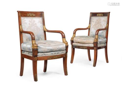 A PAIR OF FRENCH MAHOGANY AND PARCEL GILT ARMCHAIRS, THIRD Q...