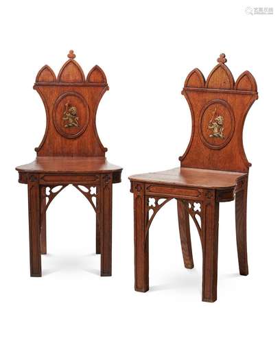 A PAIR OF OAK HALL CHAIRS, IN GOTHIC TASTE, FIRST QUARTER 19...