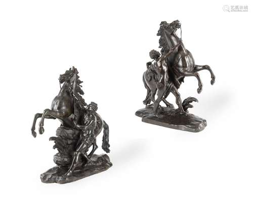 AFTER GUILLAUME COUSTOU (FRENCH, 1677-1746), A LARGE PAIR OF...