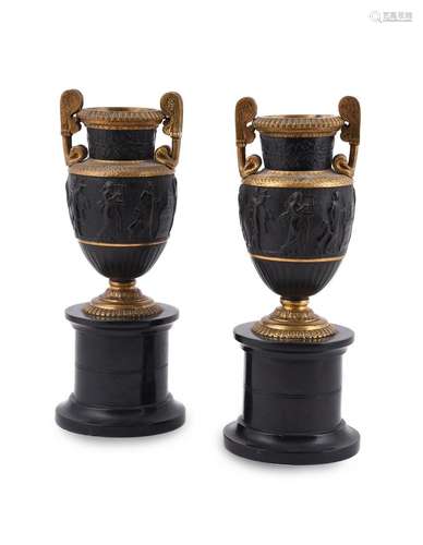 A PAIR OF FRENCH BRONZE AND PARCEL GILT VASES OF VOLUTE KRAT...