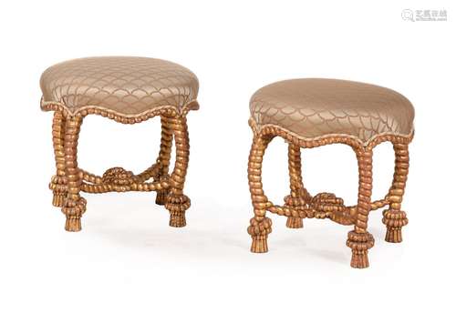 A PAIR OF GILTWOOD AND UPHOLSTERED STOOLS, IN THE MANNER OF ...