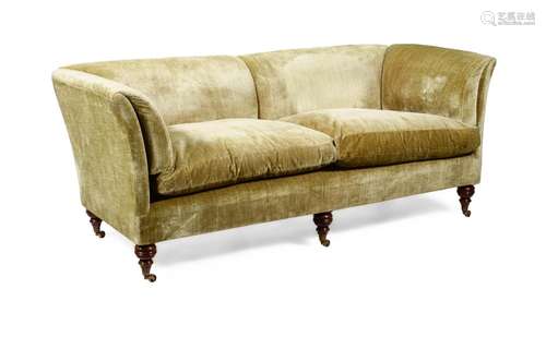 A MAHOGANY AND UPHOLSTERED SOFAIN LATE VICTORIAN STYLE, OF R...