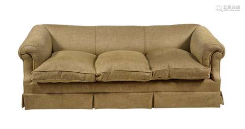 AN UPHOLSTERED SOFA, IN THE MANNER OF HOWARD & SONS, LAT...