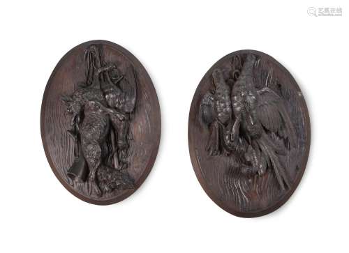 A PAIR OF BLACK FOREST CARVED HUNTING TROPHY PLAQUES, LATE 1...