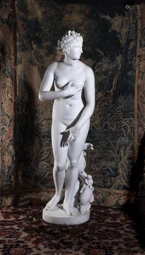 AFTER THE ANTIQUE, A LARGE CARVED WHITE MARBLE FIGURE 'THE M...