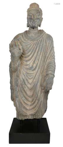 A Gandhara life size standing standing figure of Buddha