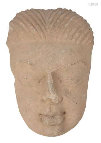 A Post-Gupta period sandstone face of Buddha