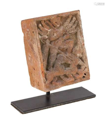 A terracotta carved brick depicting Durga killing the buffal...