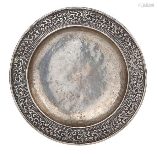 A rare early chased and repousse work silver dish