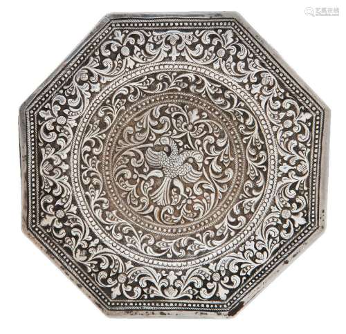A small repousse work silver dish