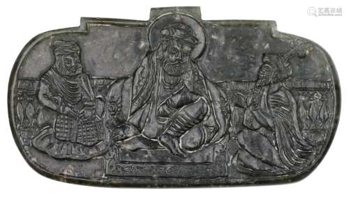 A Sikh carved jade pendant depicting Guru Nanak with Bala an...