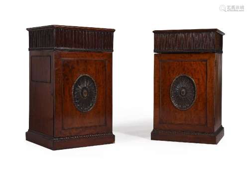 A PAIR OF GEORGE III MAHOGANY AND PARCEL GILT PEDESTAL CUPBO...