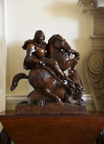 A LARGE CARVED OAK MODEL OF ST. GEORGE AND THE DRAGON, PROBA...