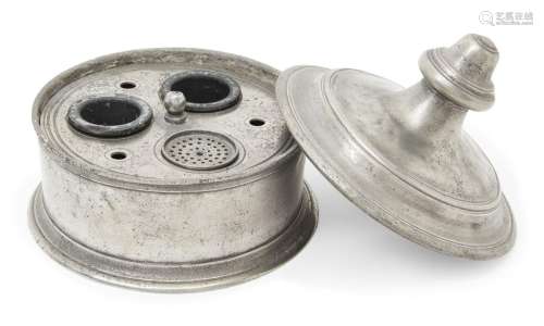 A pewter lidded container