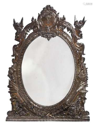 A CONTINENTAL SILVER PLATED REPOUSSE METAL WALL MIRROR, SECO...