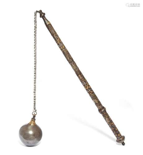 A silver and gold inlaid mace