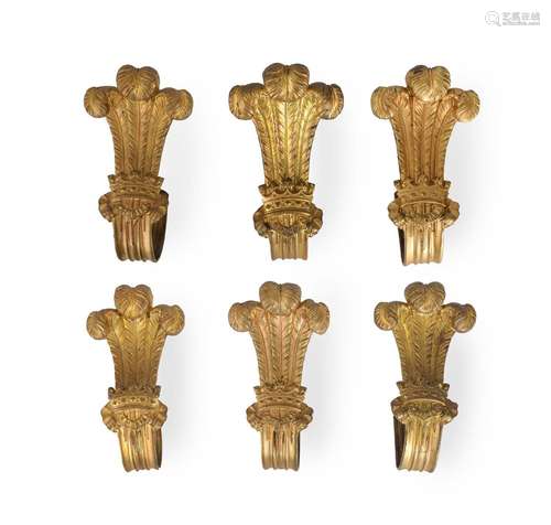 A SET OF SIX GILTMETAL CURTAIN TIE-BACKS, LATE 19TH/20TH CEN...