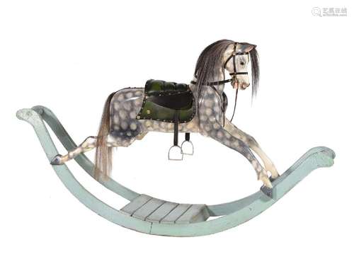 A PAINTED WOOD ROCKING HORSE, 20TH CENTURY