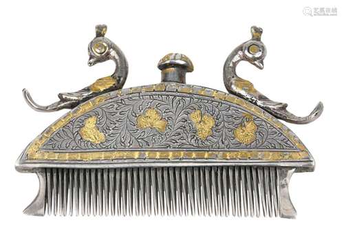 A gilt-decorated silver hair comb