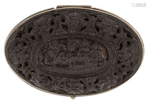 A deeply carved ebony and silver inlaid casket in the form o...
