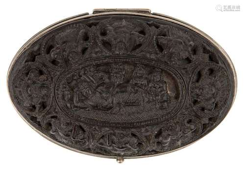 A deeply carved ebony and silver inlaid casket in the form o...