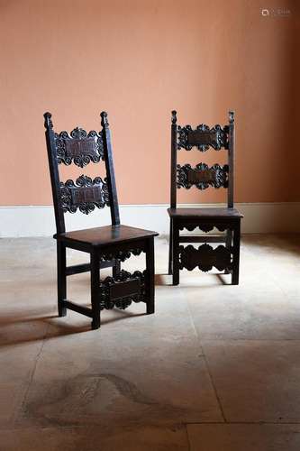 A MATCHED PAIR OF ITALIAN CARVED WALNUT CHAIRS, PROBABLY LOM...