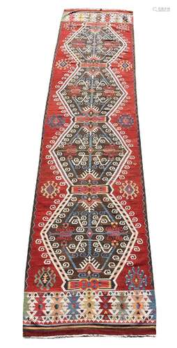 A CAUCASIAN KILIM RUNNER, approximately 434 x 99cm