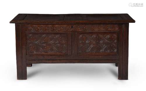 A JAMES I OAK PANELLED CHEST OR COFFER, CIRCA 1620